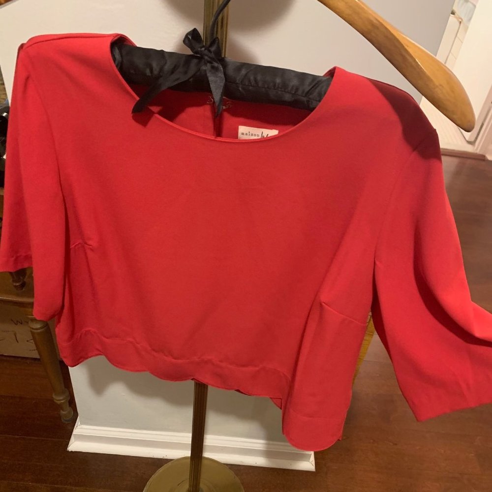 Hot pink blouse with decorative hem
